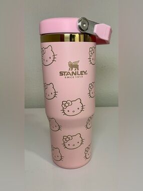 Pink 30 oz Stanley Travel Tumbler with custom Gold Ri & Hello Kitty motifs